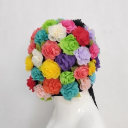 Colorful flower headwear artist